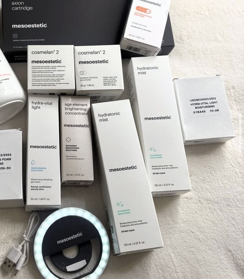 Boxes of mesoestetic cosmelan 2 home-care cream alongside other mesoestetic skincare at Glow By Yaz in Bletchley, Milton Keynes